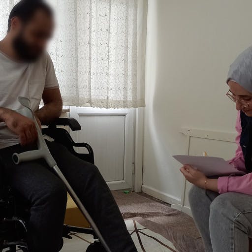 Because of an old battle injury, Mahmoud is in danger of losing his leg.